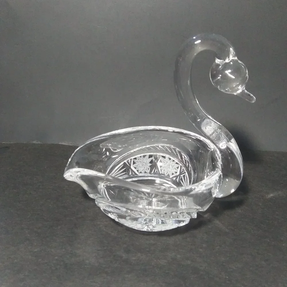 lovely clear glass swan shaped trinket dish with cut design on sides